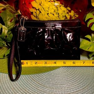 Coach Patent Leather wristlet.